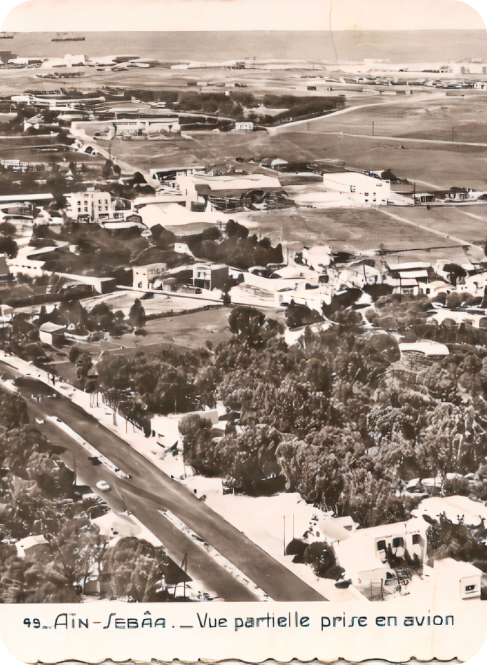 Modern buildings and cityscape reflecting Ain Sebaa's growth.